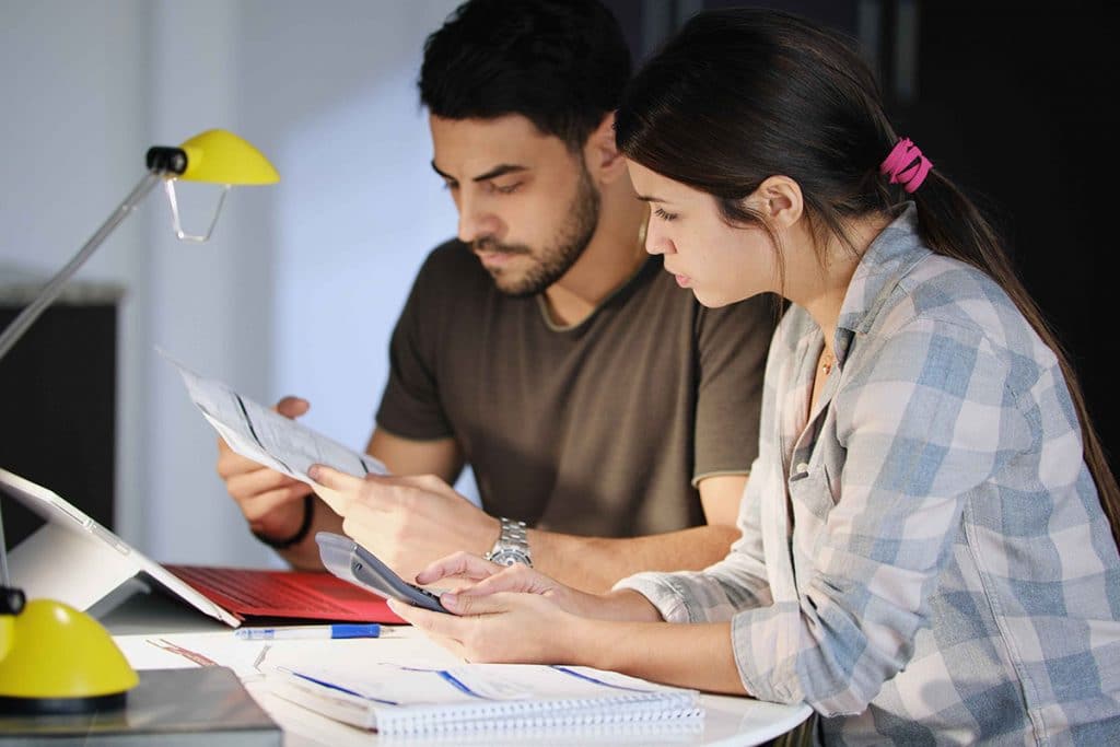 Man and Woman Worried For Taxes And Family Budget